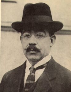 Leopoldo Lugones combrero y corbata tejida